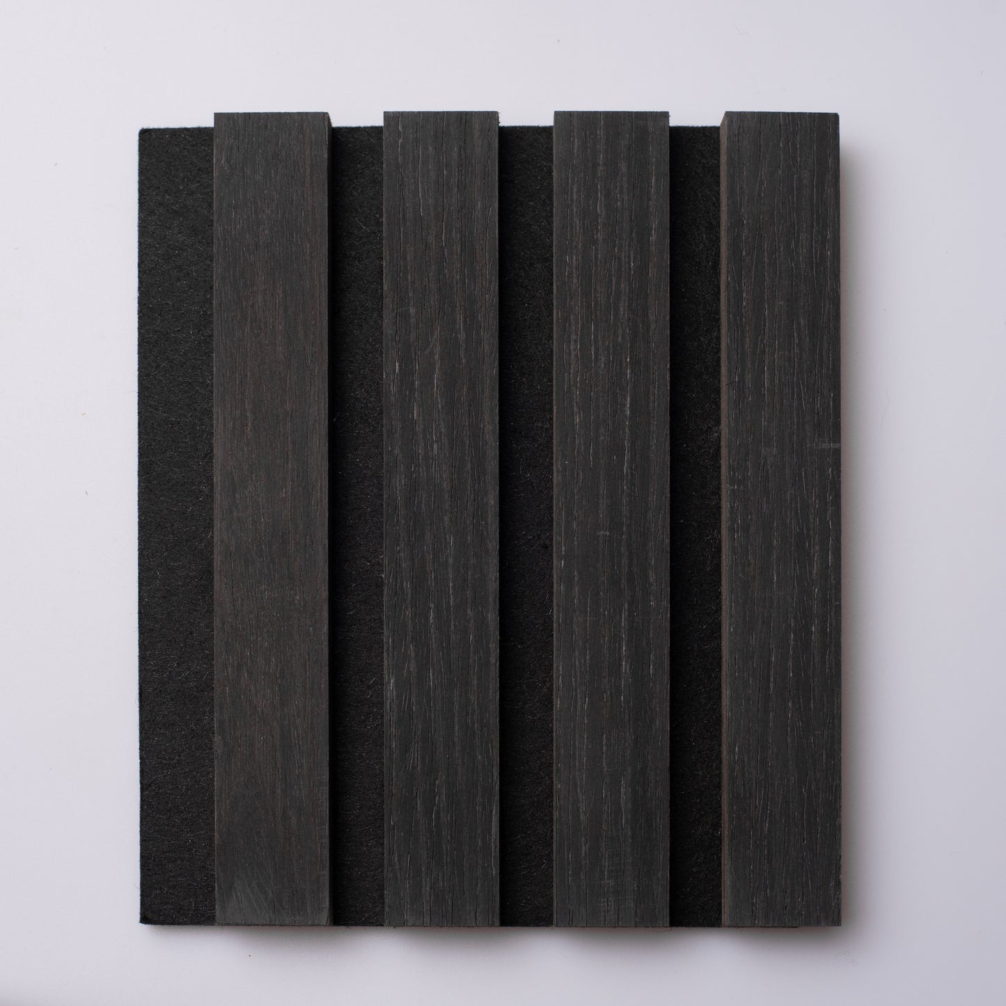 Sample size panel of NüBatten's Charcoal Oak Wood Slat Panel