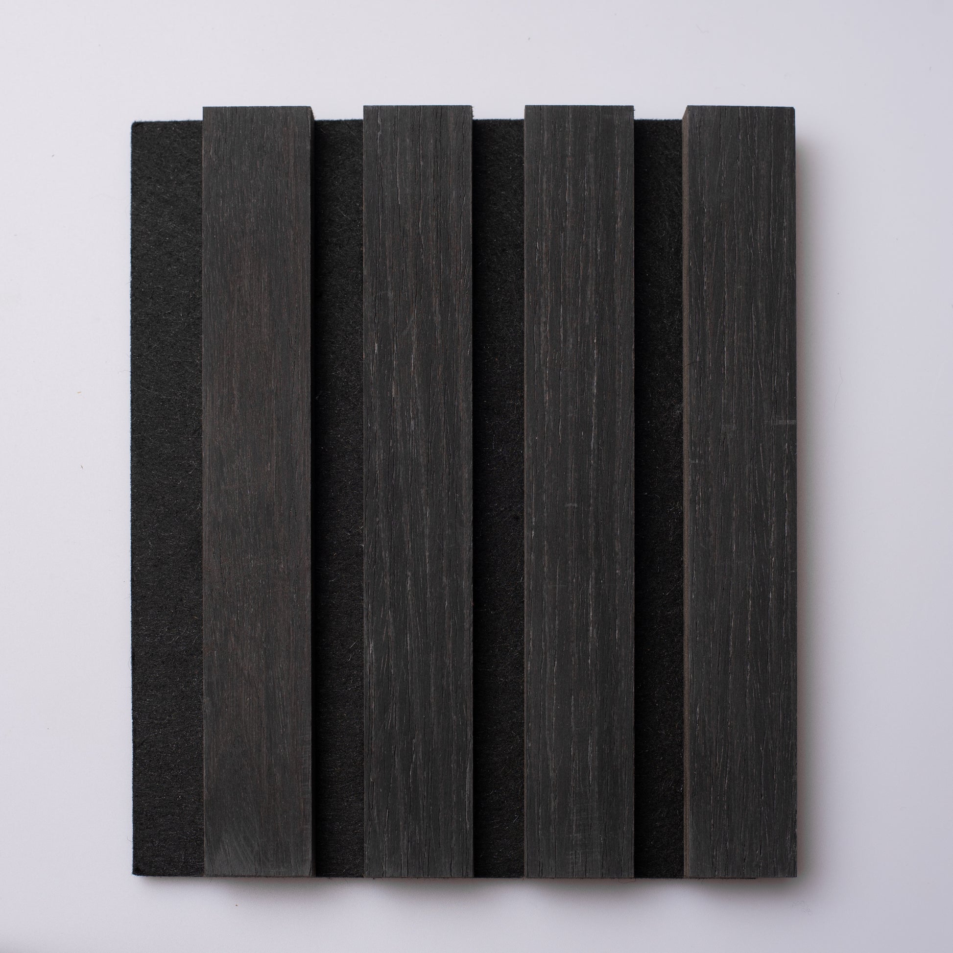 Sample size panel of NüBatten's Charcoal Oak Wood Slat Panel
